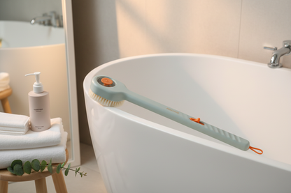 2-in-1 Push-Pull Liquid Bath Scrubber Brush in spa bathroom setting